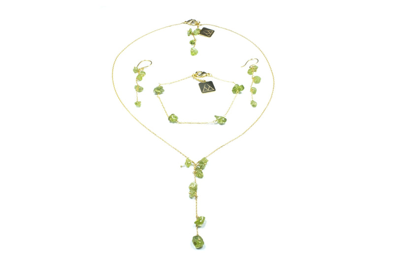 GOLDEN STAINLESS STEEL SET WITH A PERIDOT CASCADE